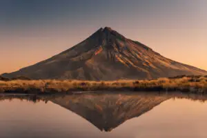 Mountain and its reflection in a lake at its feet.